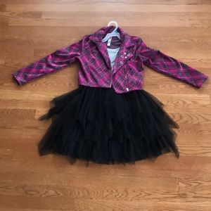 Purple and black jacket with gray and black dress